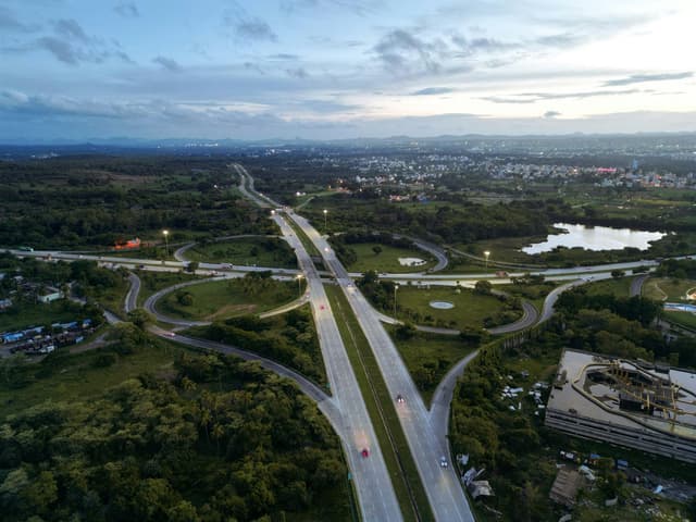 Aerial view of a highway interchange at dusk